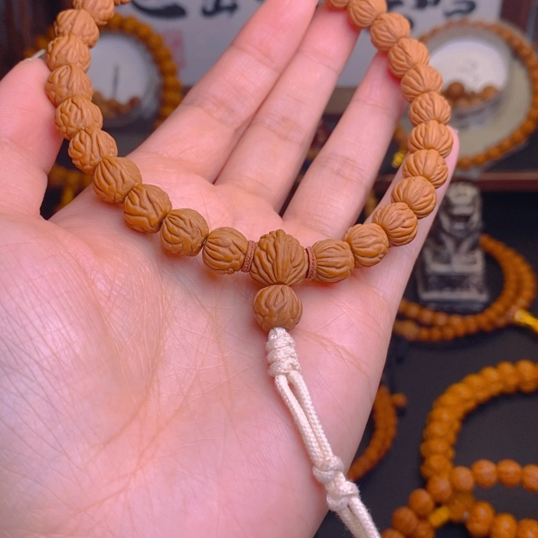 孤****桃核手串龙文桃核