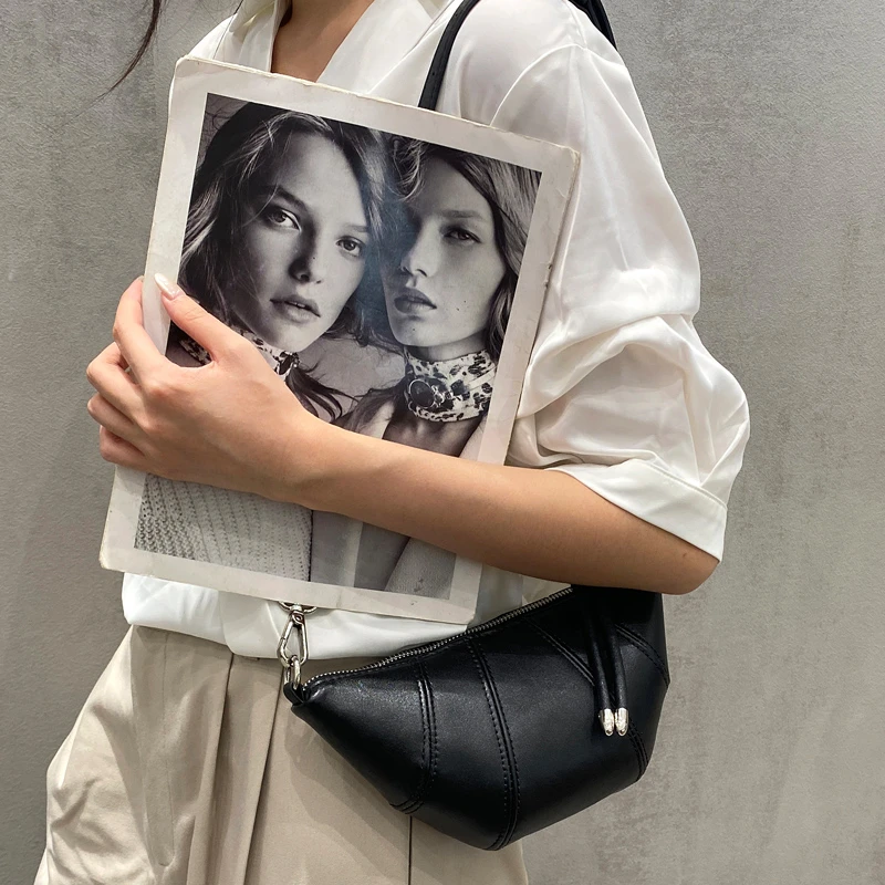 牛角包软牛皮休闲女包手机零钱包2026春季新款真皮单肩斜挎小包包