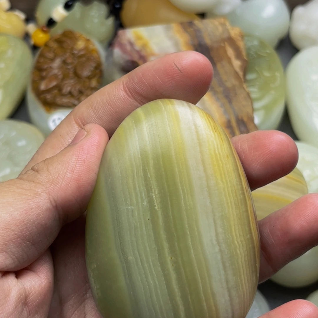 用***2石材方解石手把件