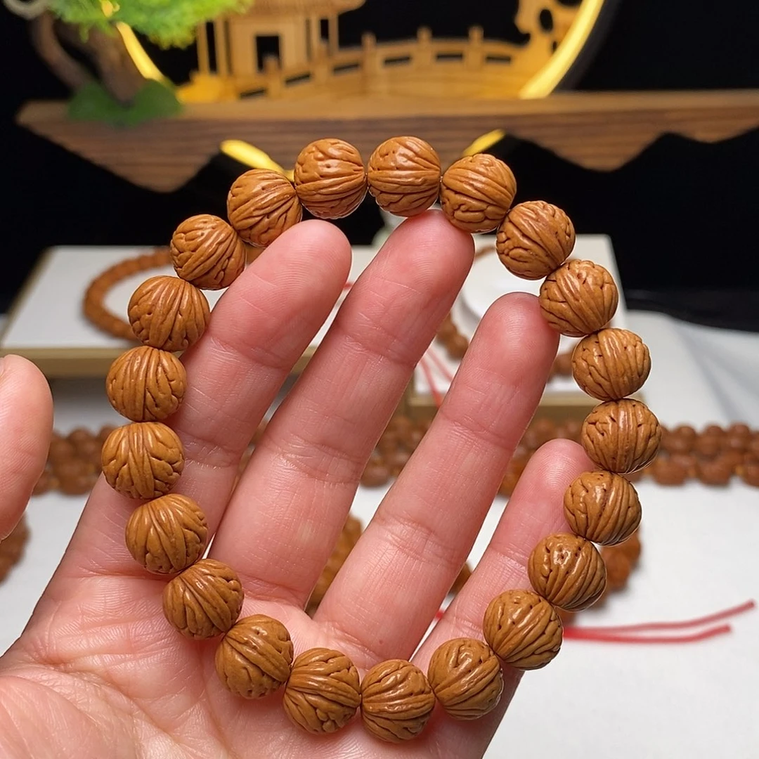 桃核手串12mm野生金麒麟桃核手串