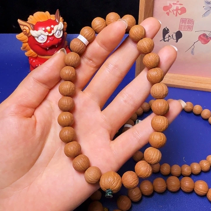 用***0猴头核桃吊坠凤羽