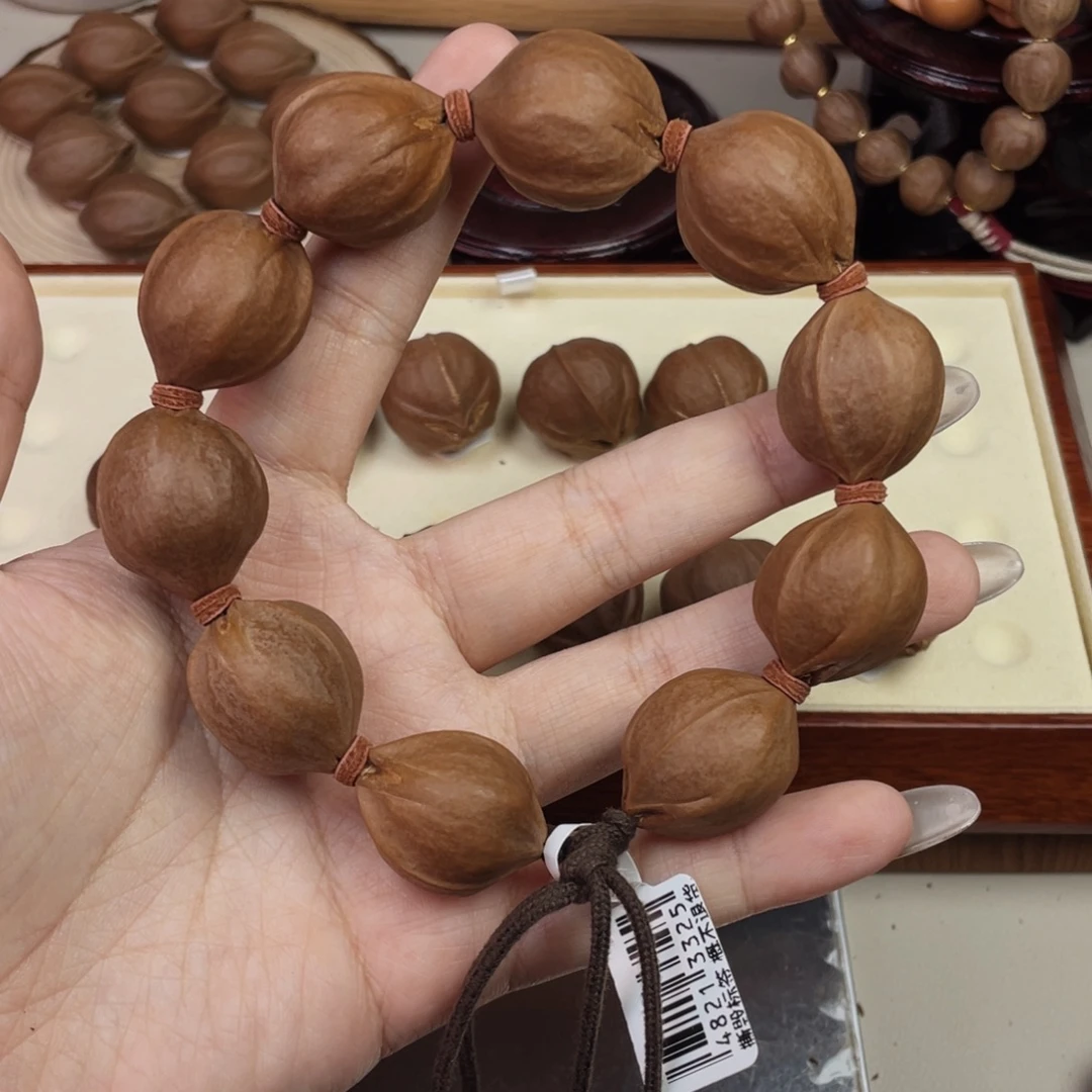 郭***庚手串/手链橄榄核22.526梅林铁核