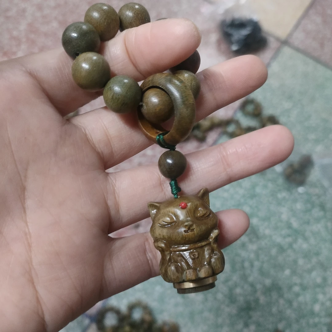 绿檀九尾狐狸香囊小手捻 镂空雕刻 手把件 加一瓶香丸