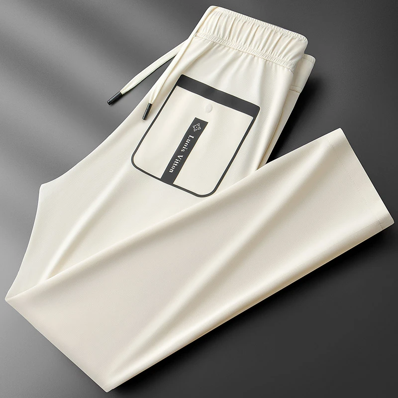 夏季新款潮流时尚华夫格压胶冰丝轻薄男士运动卫裤直筒休闲裤男潮