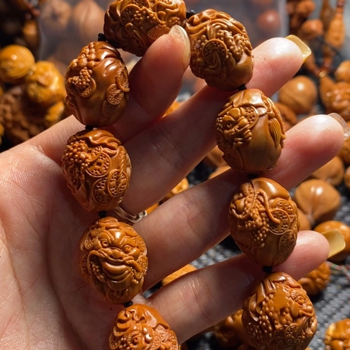 橄榄核吊坠金蟾手串