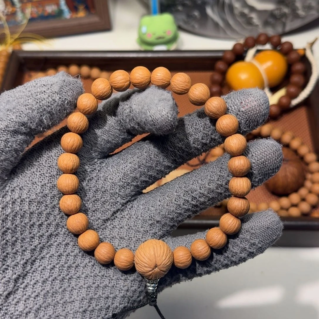 吊坠猴头核桃磨盘凤羽