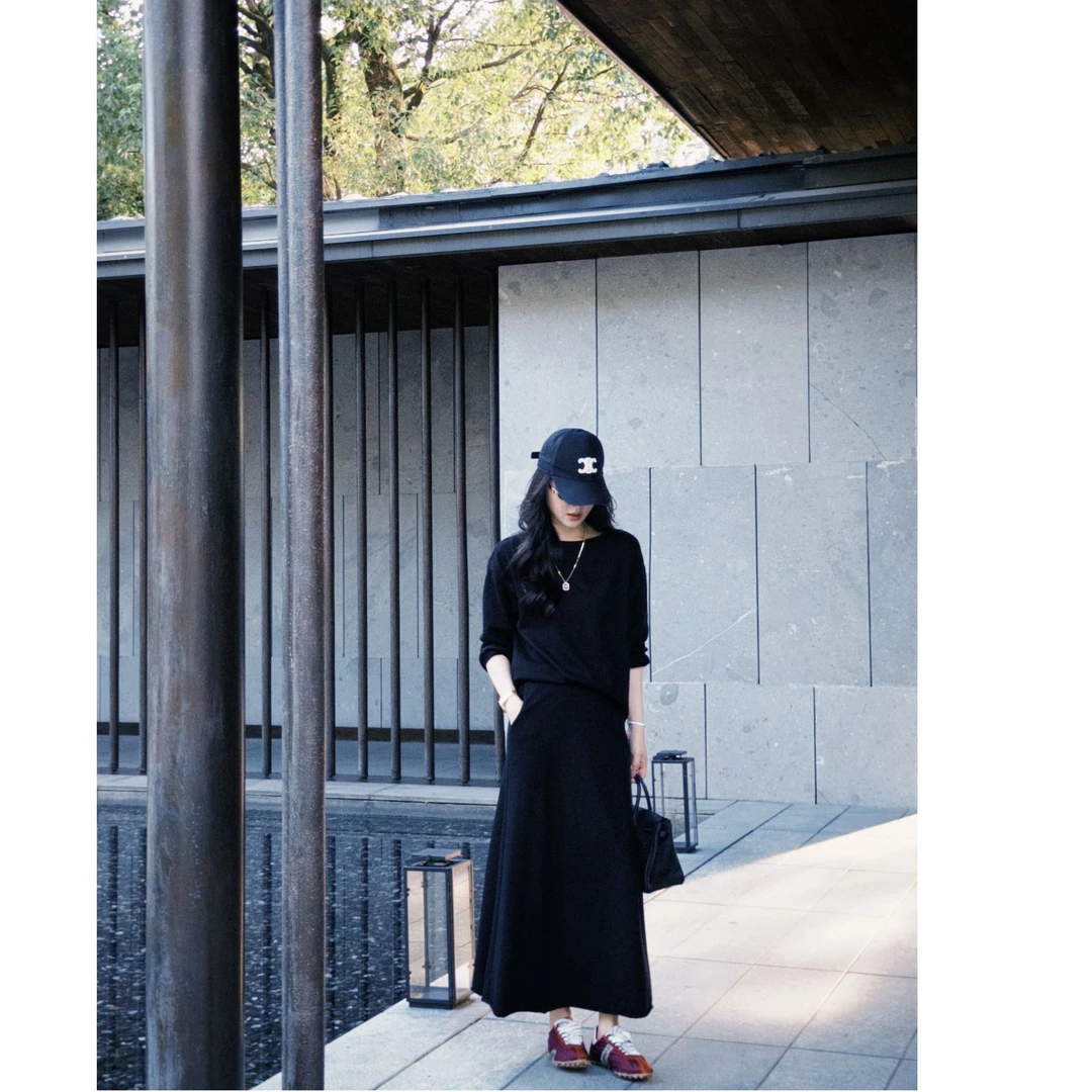 希娜 绵羊毛日常慵懒风卷边针织宽松上衣