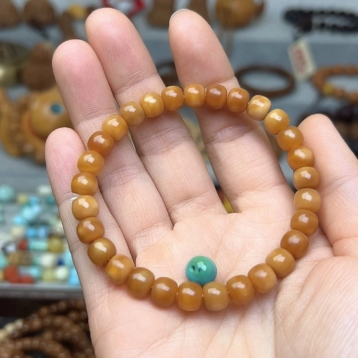 菩提根/象牙果吊坠小*?7.7m m龙脊老料玉华