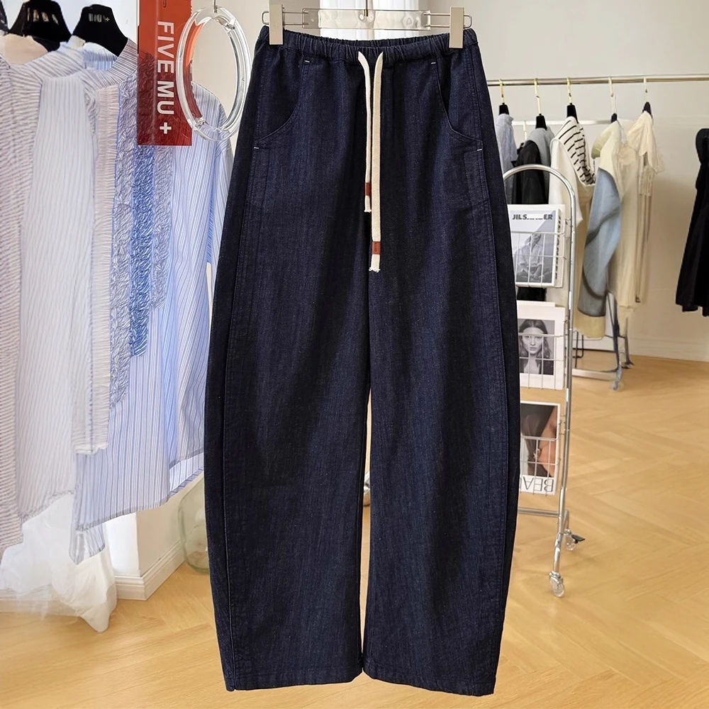 今年流行爆款裤子慵懒风松紧腰抽绳休闲裤女春秋弯刀牛仔裤长裤