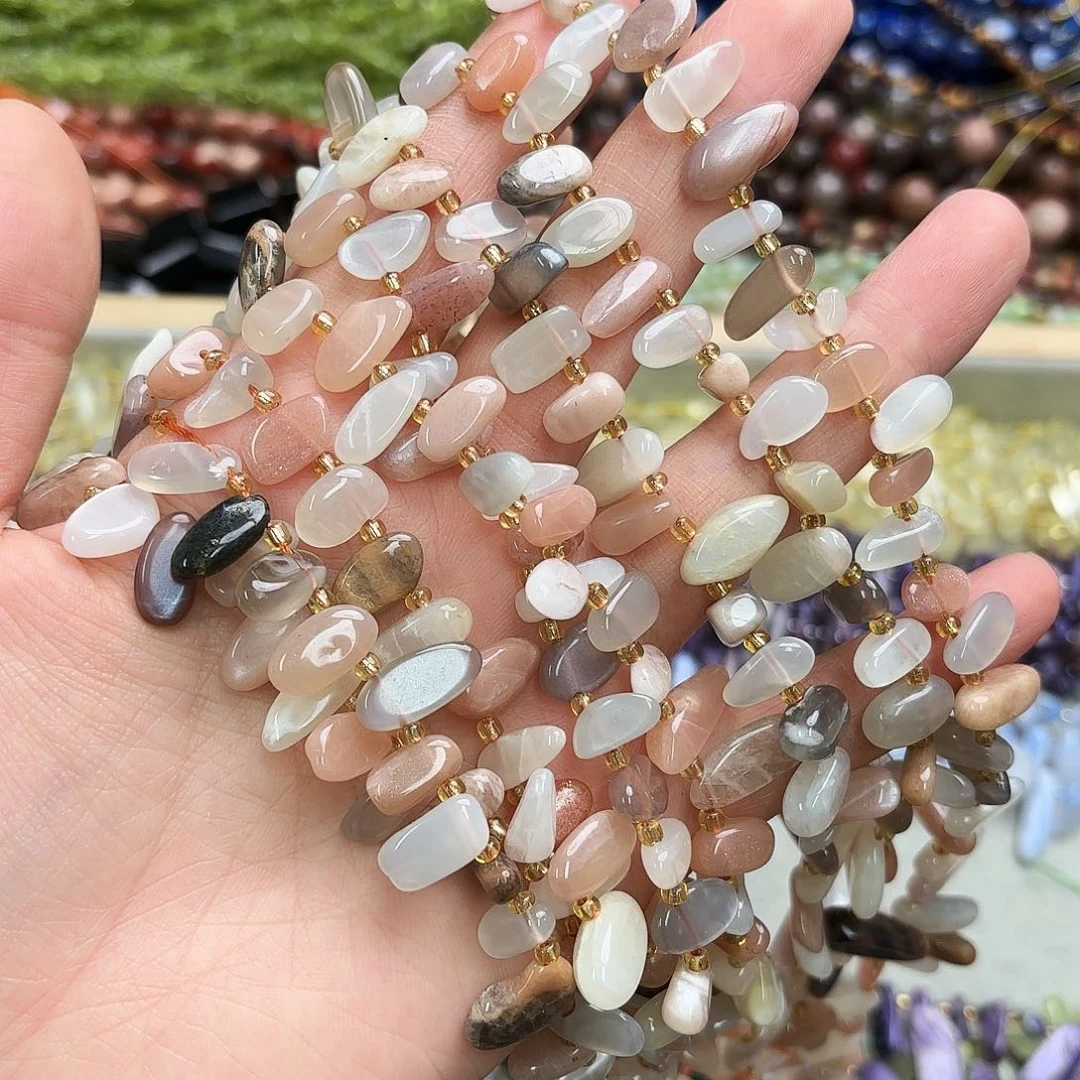 玛瑙/玉髓未镶嵌珠宝半成品彩月光大牙一条