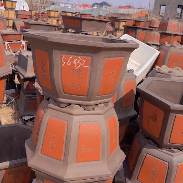 红陶口径56高32…………………………