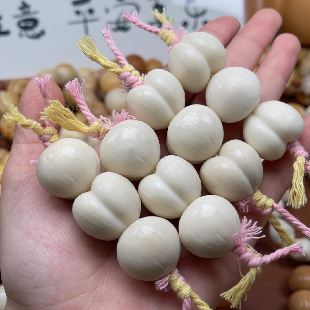 吊坠菩提根/象牙果T29-2屁桃23-25瑕疵一串随机