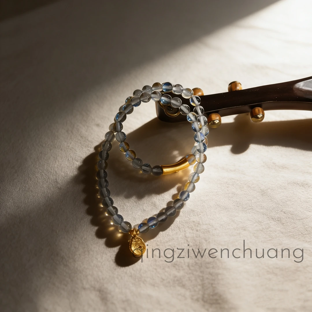 DL 1359-蓝月光双圈水晶+竹节福袋金配饰