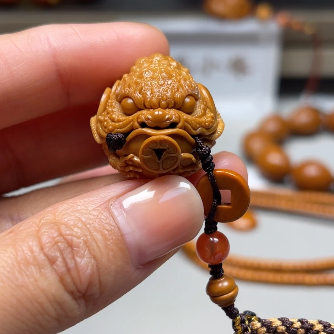 吊坠橄榄核订金蟾单颗，