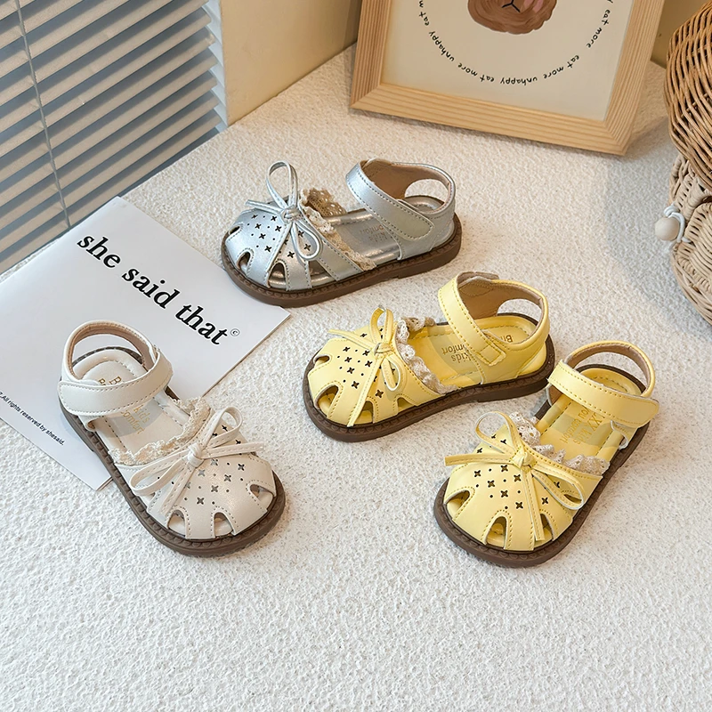 女童凉鞋2025夏季新款女宝宝可爱蝴蝶结公主鞋儿童镂空防踢沙滩鞋