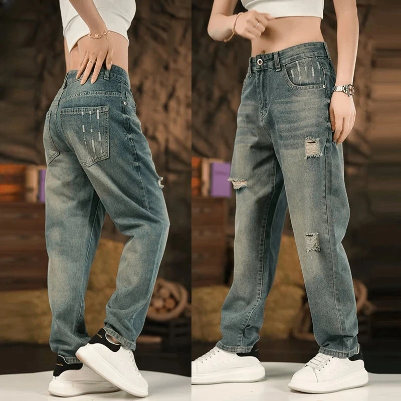 2025秋季新款破洞九分牛仔裤男高端休闲锥形小直筒时尚印花哈伦裤
