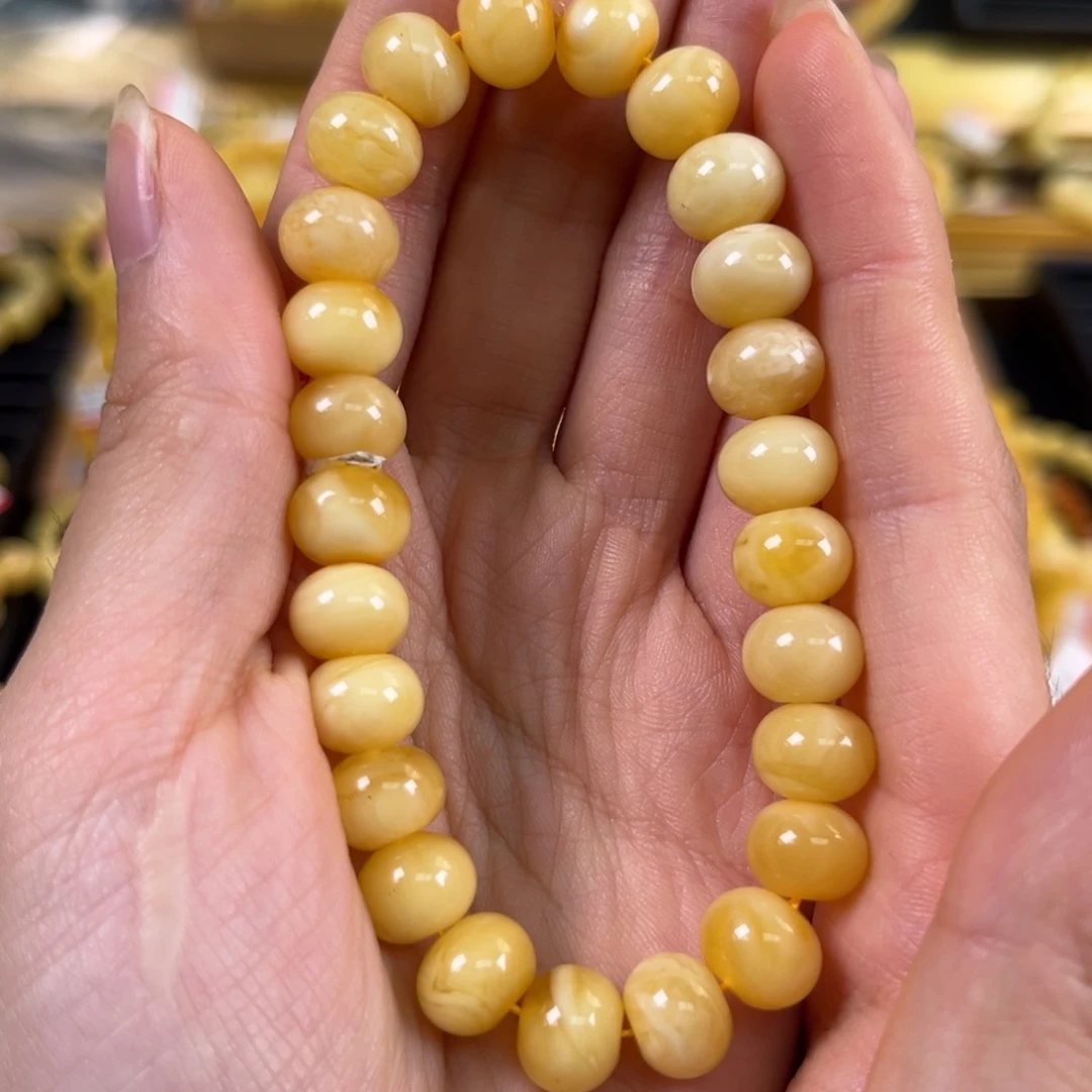 裸石琥珀未镶嵌9.8浓白花算盘珠