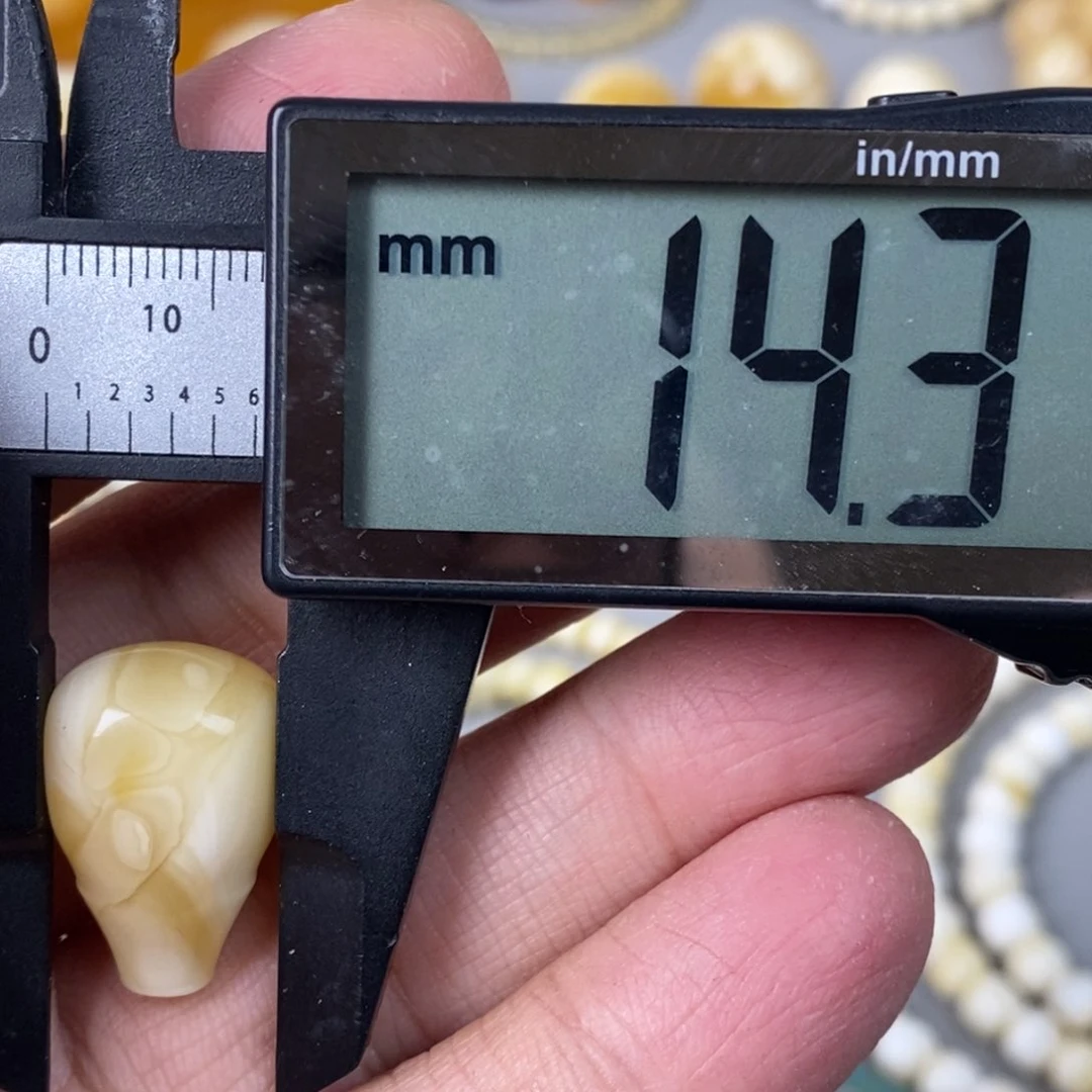 琥珀珠宝奇石未镶嵌有个小针尖话费