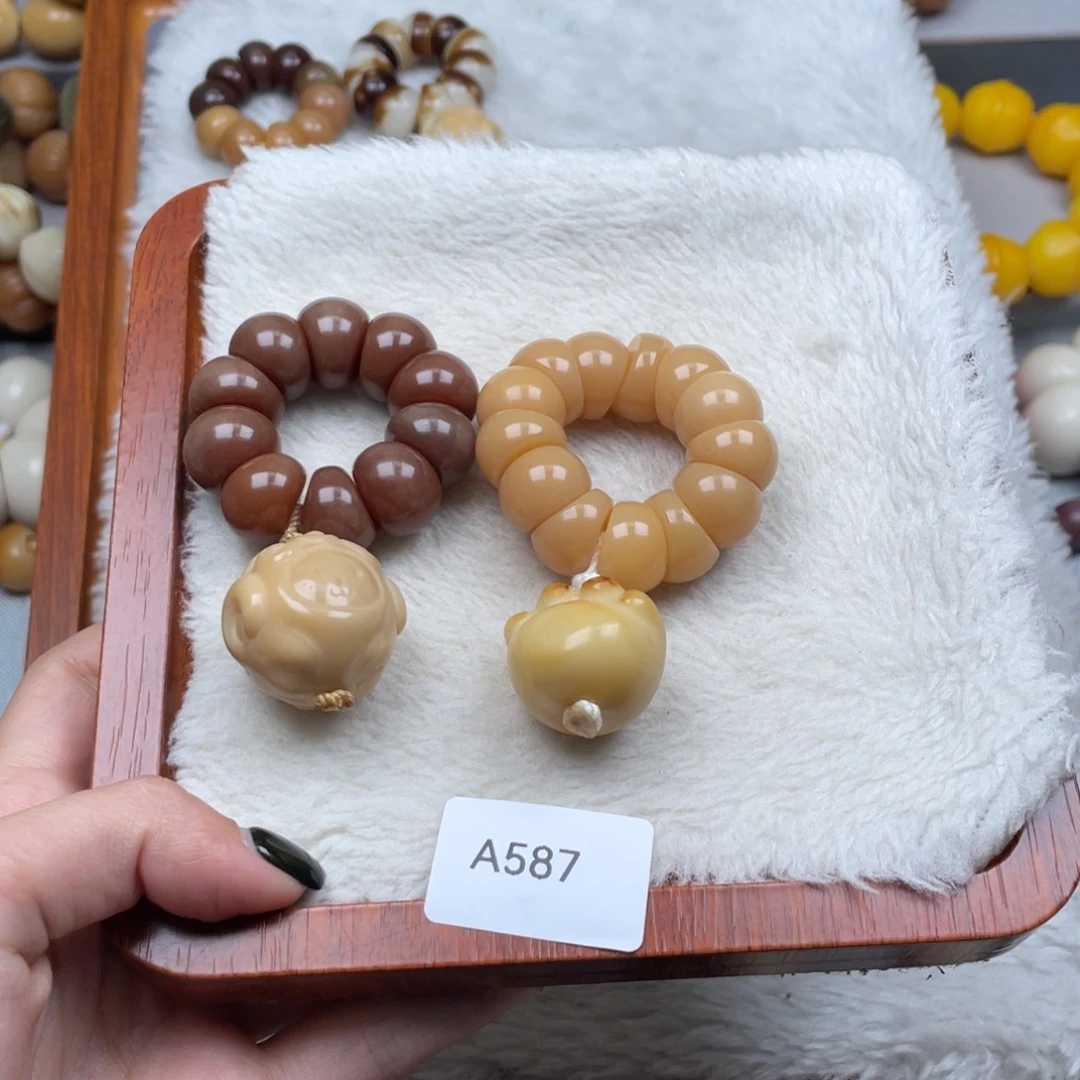 R***_菩提根/象牙果手串瑕a587蒜瓣手捻一串13m