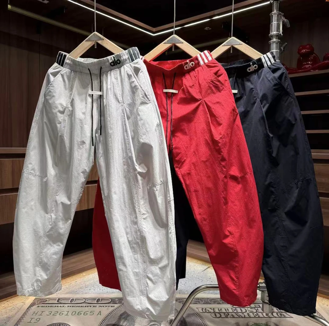 6806夏季新款高级感户外撞色拼接冲孔透气设计宽松弯刀休闲裤