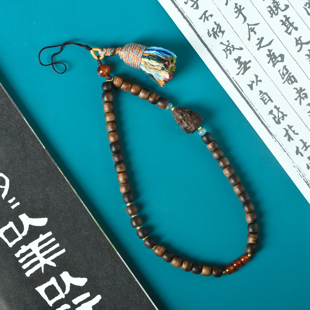 紫奇楠沉香6x7老型珠财爷爷手机链