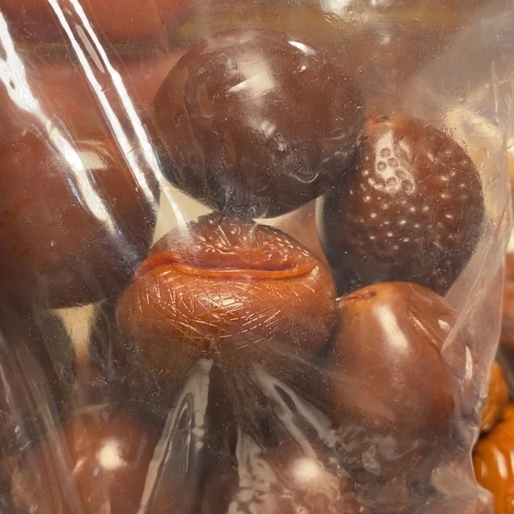 橄榄核吊坠随*纯手工手持