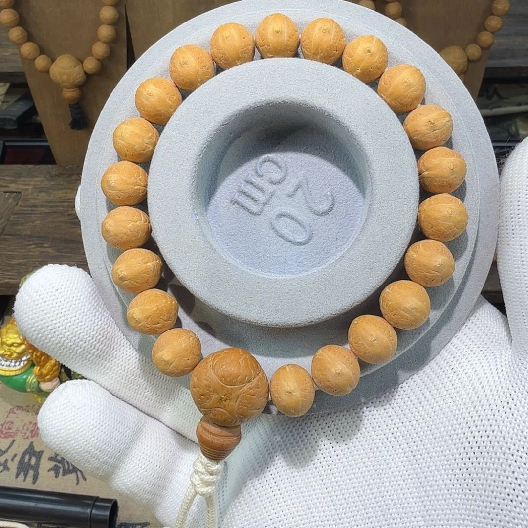 海***良手串凤眼菩提飞碟实心12mm奶油皮