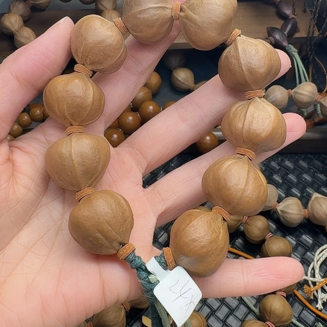 手串橄榄核19。2.4*2.3梅林铁