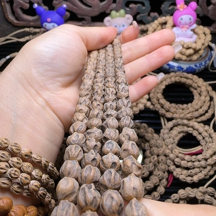 孤***狼柏香籽/百香籽吊坠