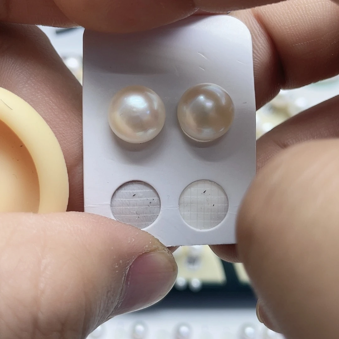 暖****银S925镶嵌淡水珍珠耳饰