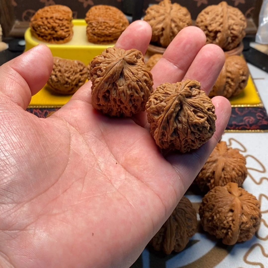 桃核把件放漏南疆