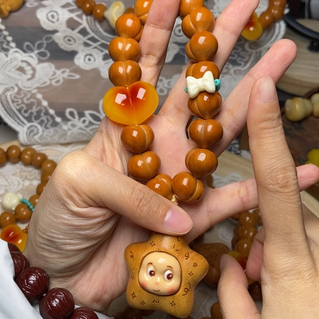 吊坠猴头核桃屁桃玻璃底卡15