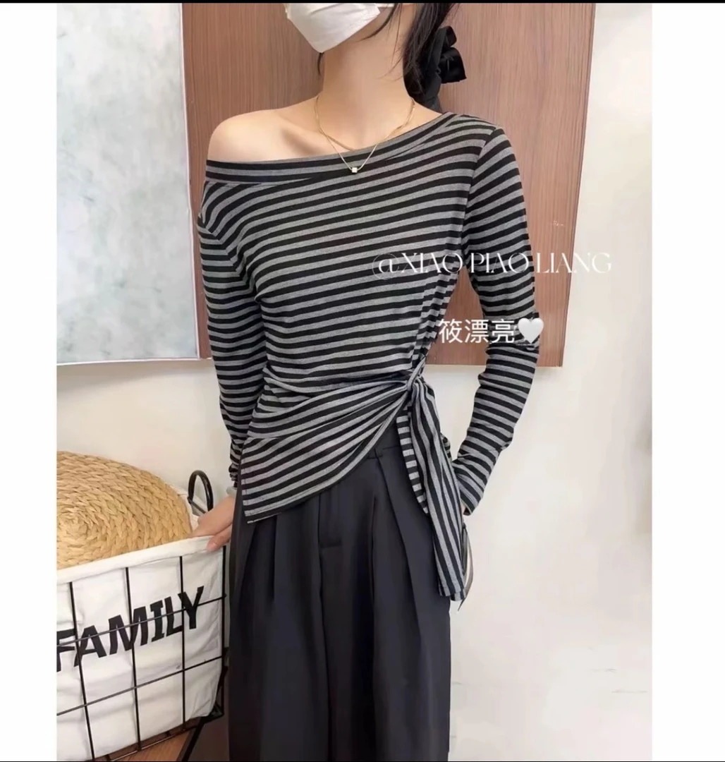 辣妹风斜肩长袖t恤女秋季高级不撞款收腰绑带显瘦独特漂亮上衣