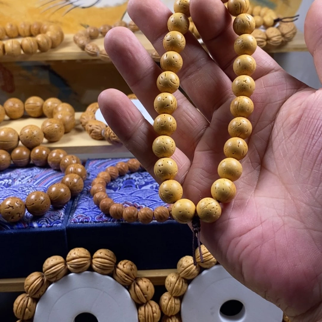 桃核吊坠用****0盘锦奶油核正圆光珠