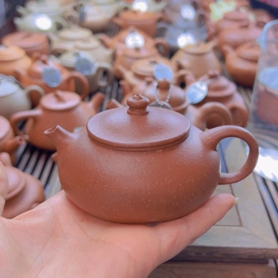 茶壶紫砂左*紫砂壶手工制作的茶具