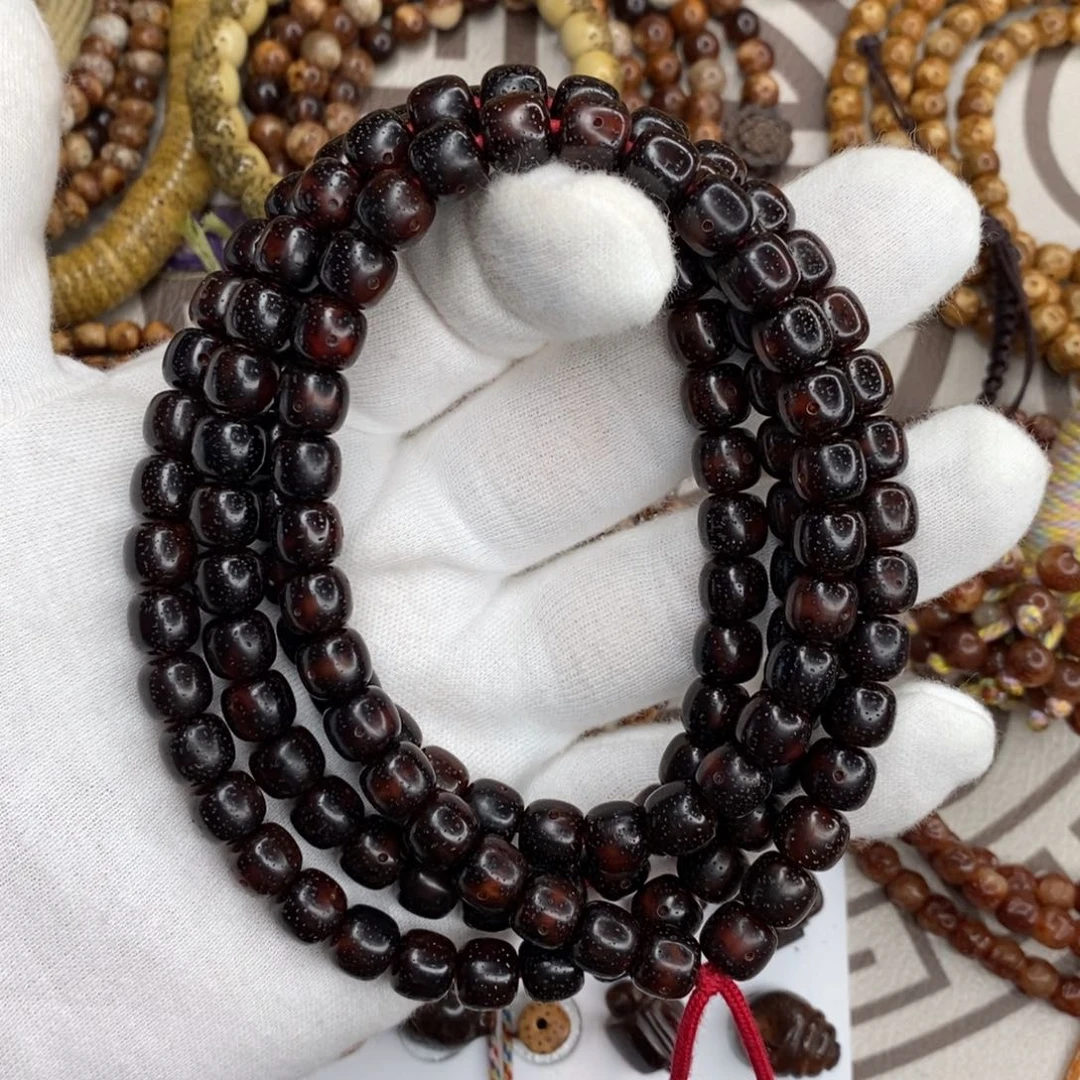 人***途星月菩提手串9黑金红宝石