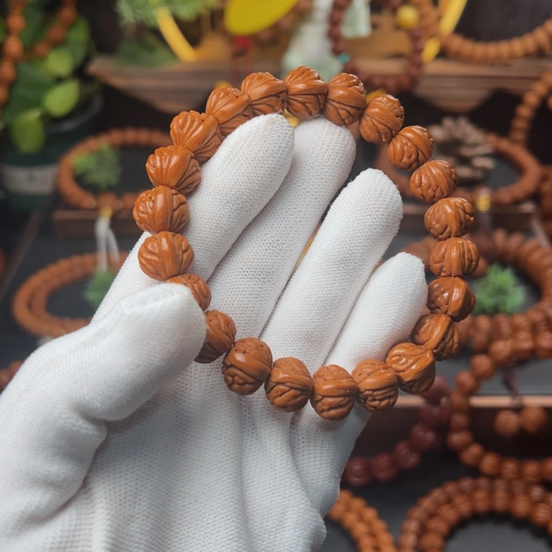 吊坠桃核还***呀12➕火麒麟手串