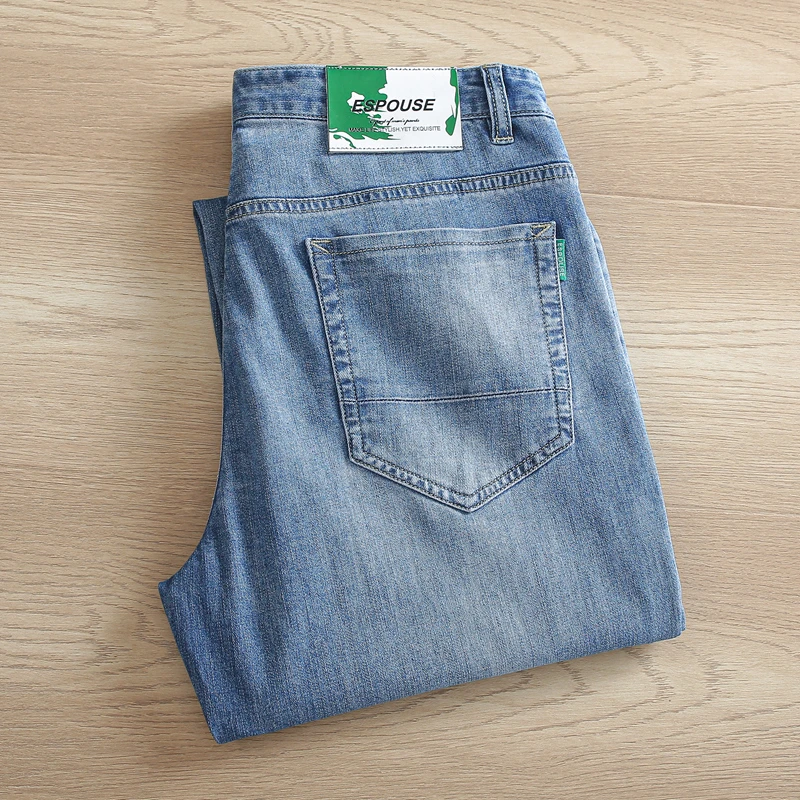 清爽时尚一线品牌撤柜浅蓝色牛仔裤男款夏季薄款弹力小直筒长裤