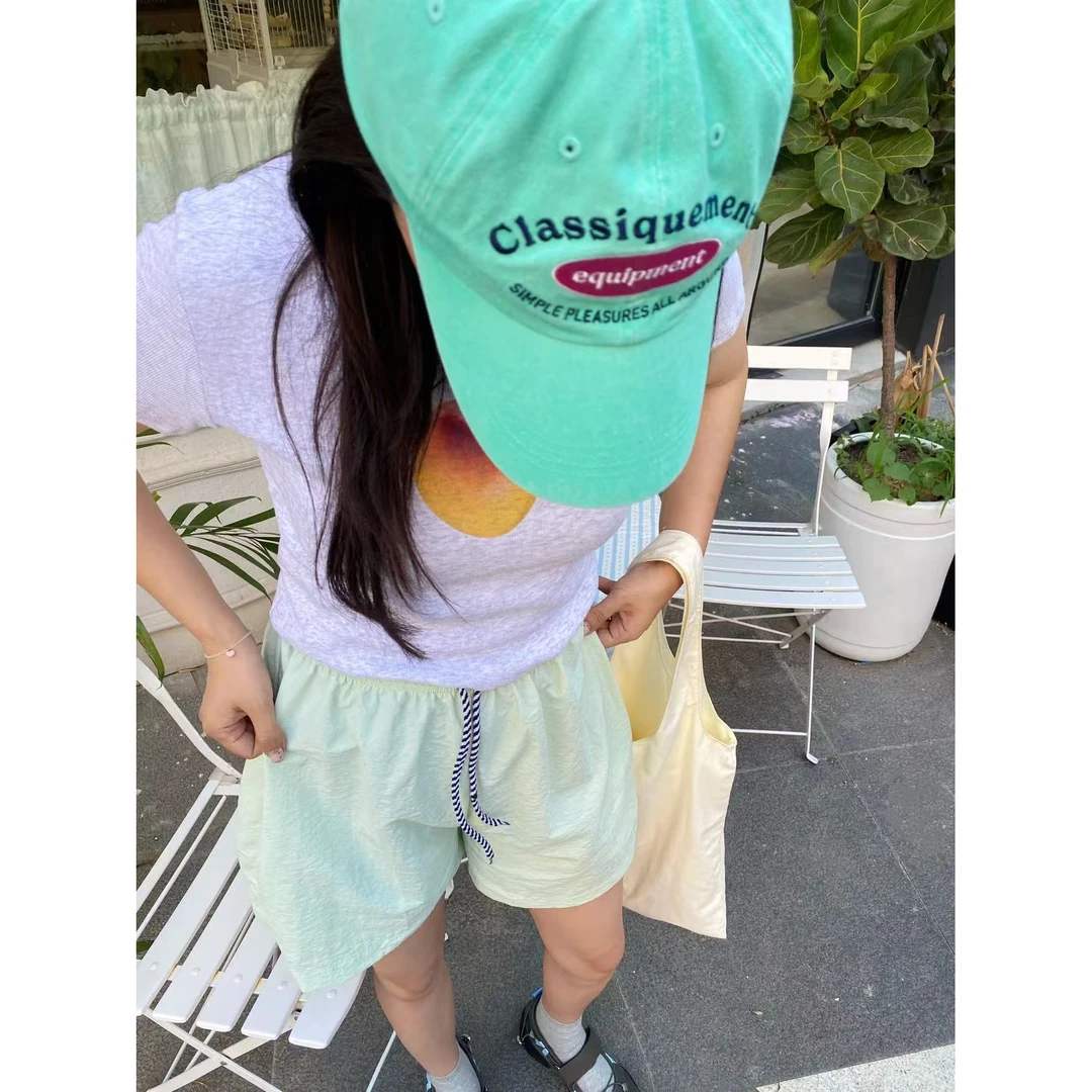 韩国代购.Call my name 青苹果速干绿短裤L25062831