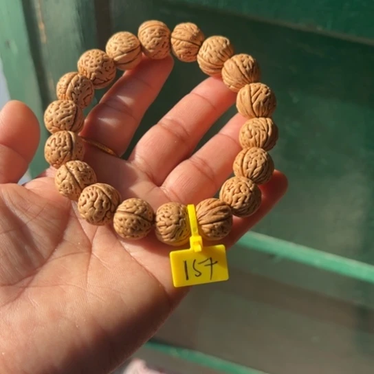 一***家木质野生桃核手串