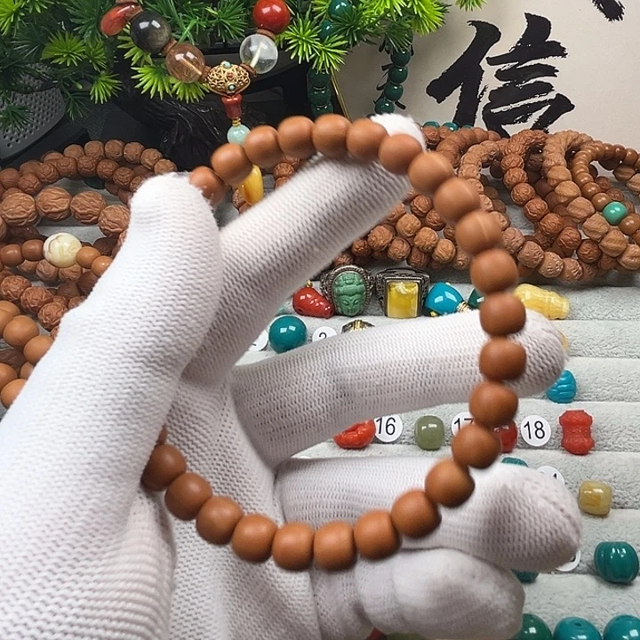 那***雪猴头核桃手串大吉文玩配饰