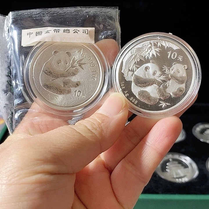 纯银毛*2000年裸猫+06年裸猫各一枚如图