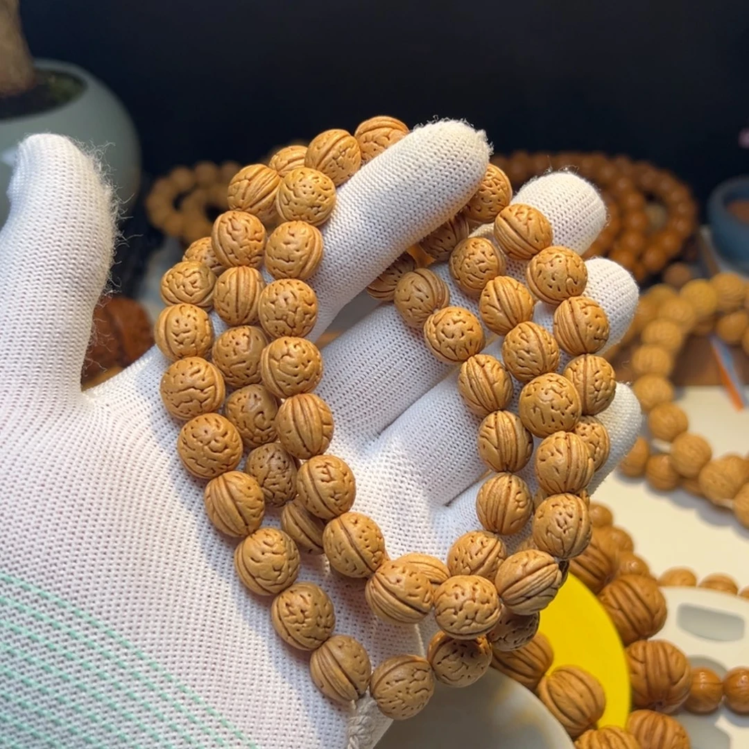 手串桃核瓜子脖挂62颗