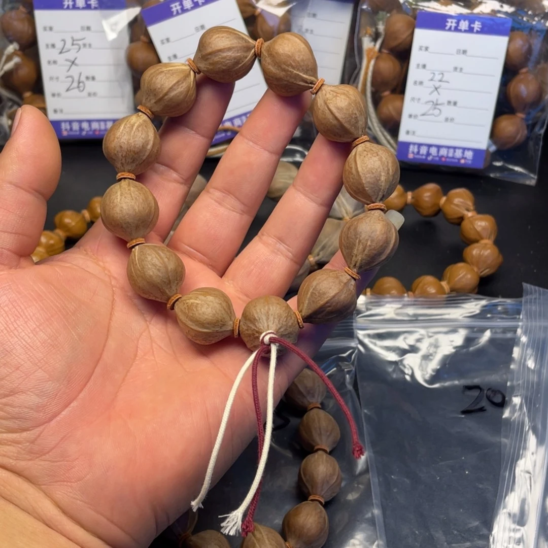 一***间橄榄核手串红肉20x23mm