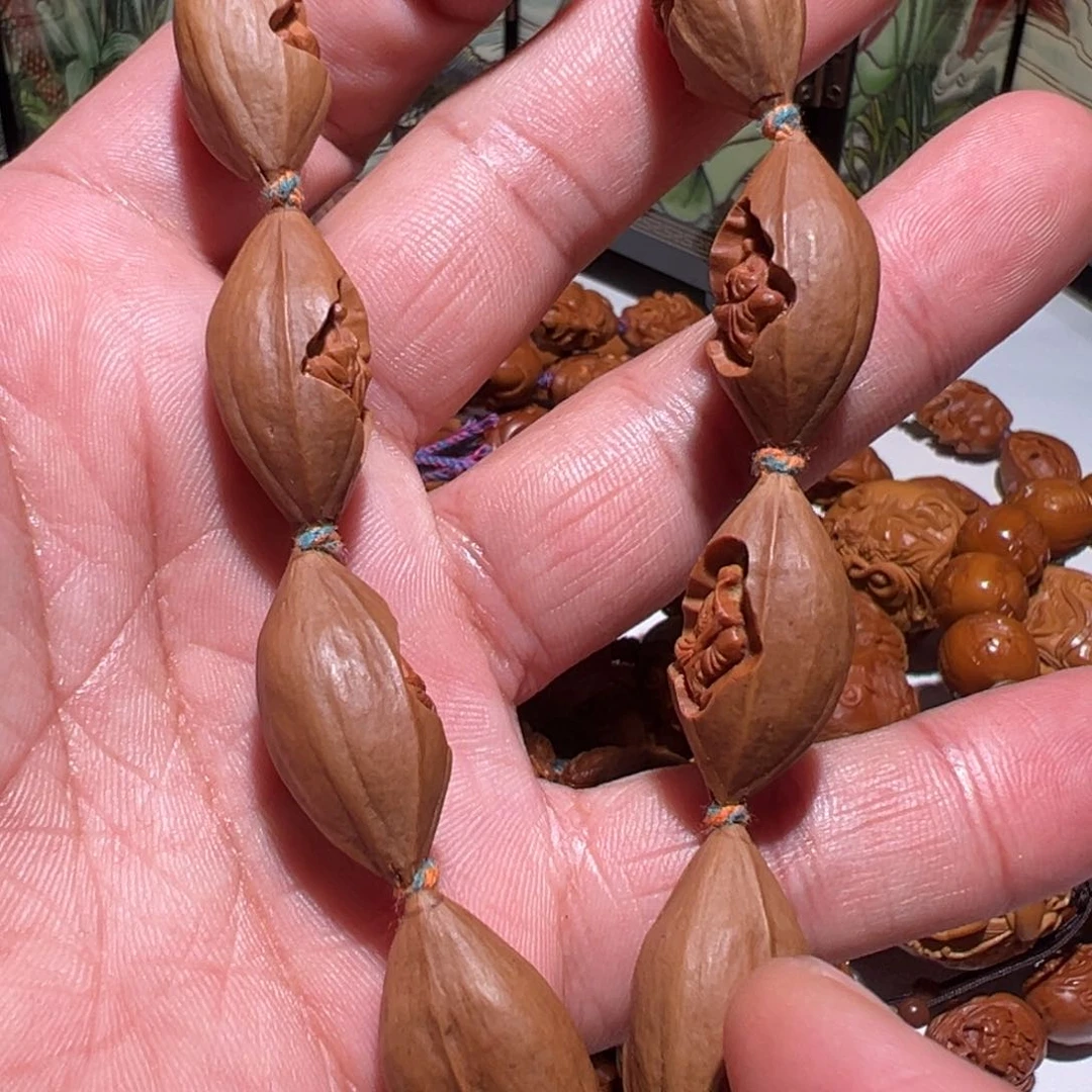 橄榄核吊坠包衣无相佛