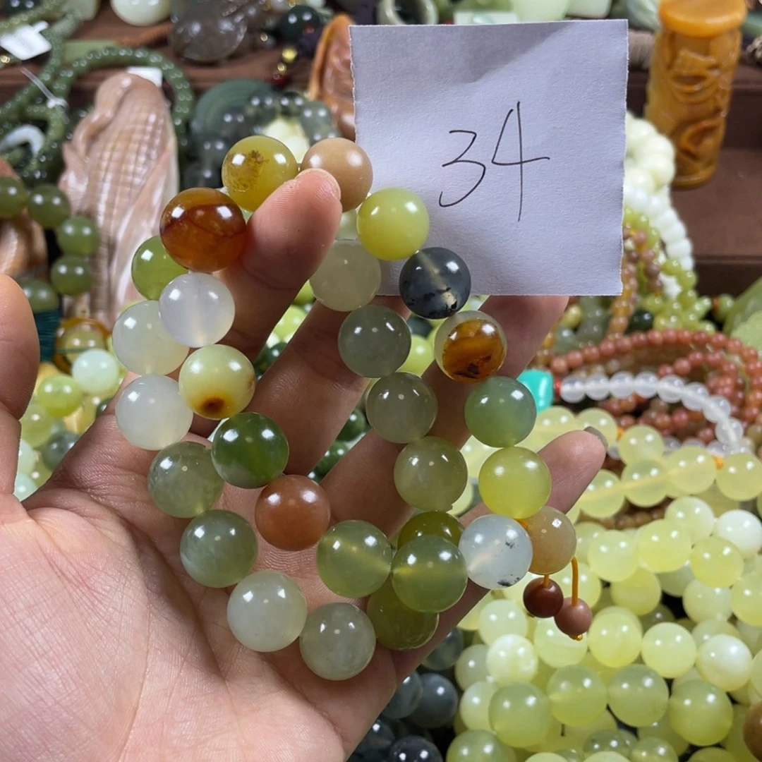 多***安未镶嵌蛇纹石玉手串