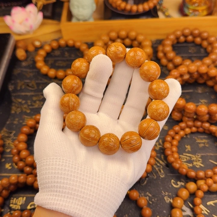 朝***来桃核手串18尺寸小金豆