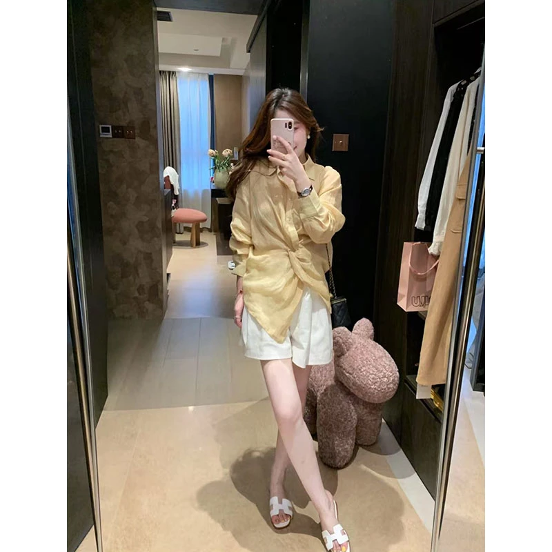 2025年夏季新款ins慵懒风V领扭结衬衫女防晒衬衣女配高腰显瘦短裤