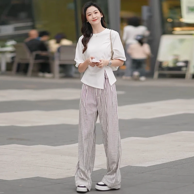 通勤风休闲时尚套装女2025夏设计感显瘦白色短袖上衣阔腿裤两件套