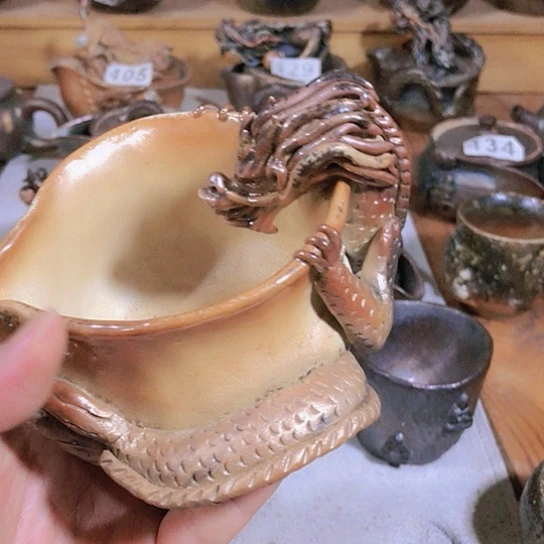 瓷片微瑕的龙公道